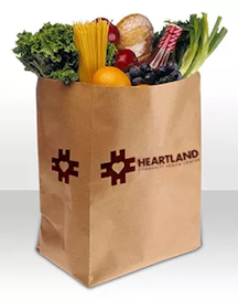 brown paper grocery bag with Heartland printed on side